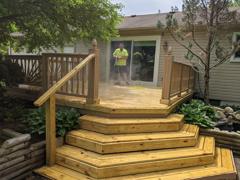 Refinishing done right can turn a tired-looking wood deck into a beautiful entertainment space.
